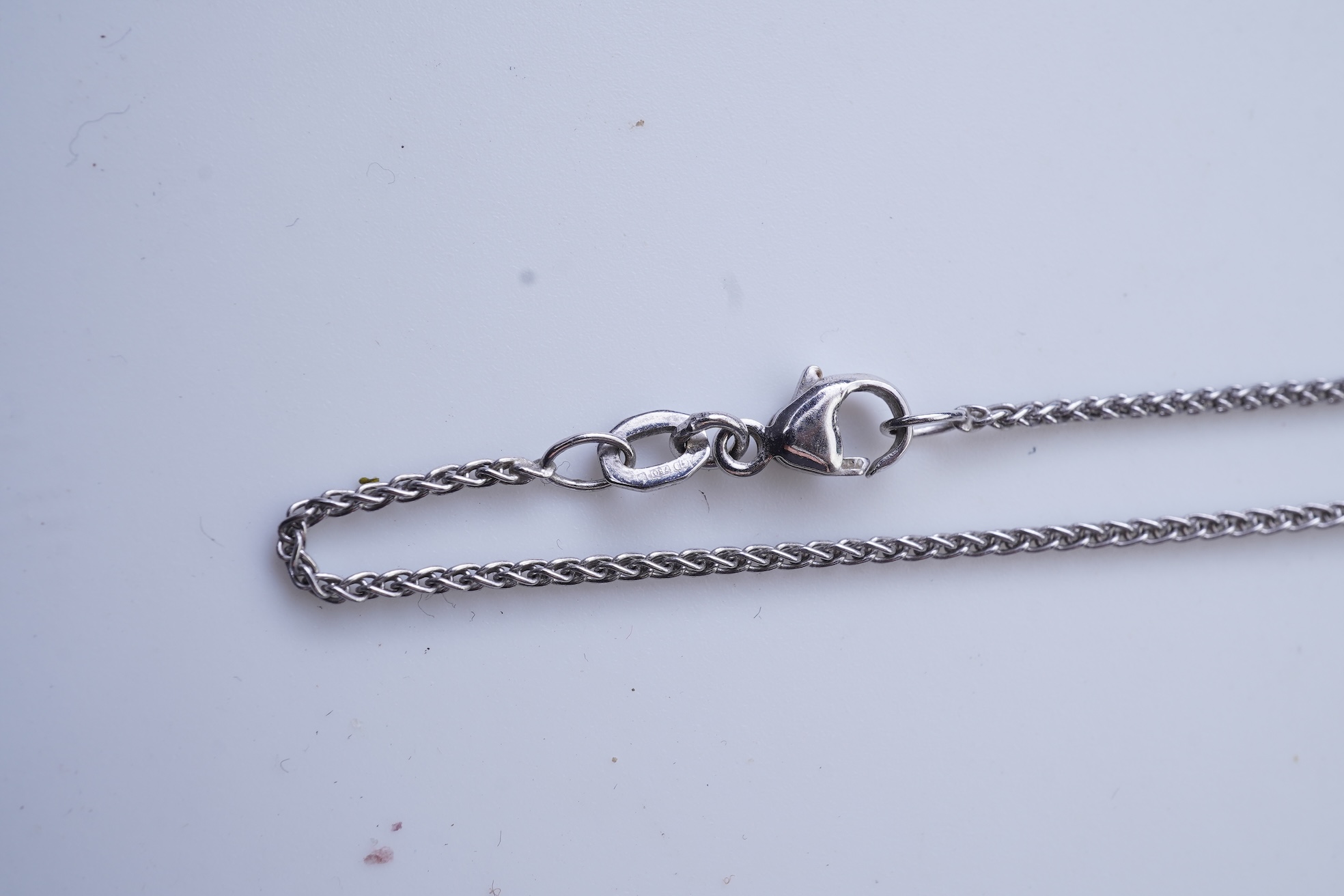 A cultured pearl and diamond pendant